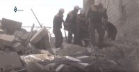 The White Helmets, a rescue group, look for hurt people.