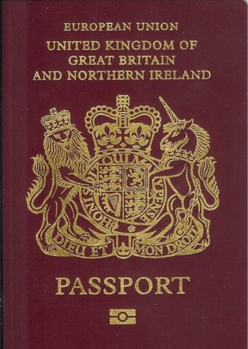 UK passports are dark red now and show that the UK is part of the European Union.