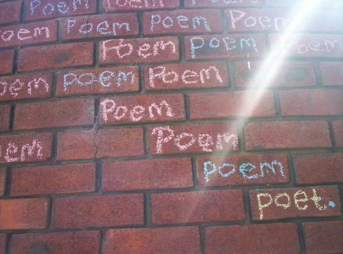 One of the ideas for National Poetry Month is to write a poem in chalk.