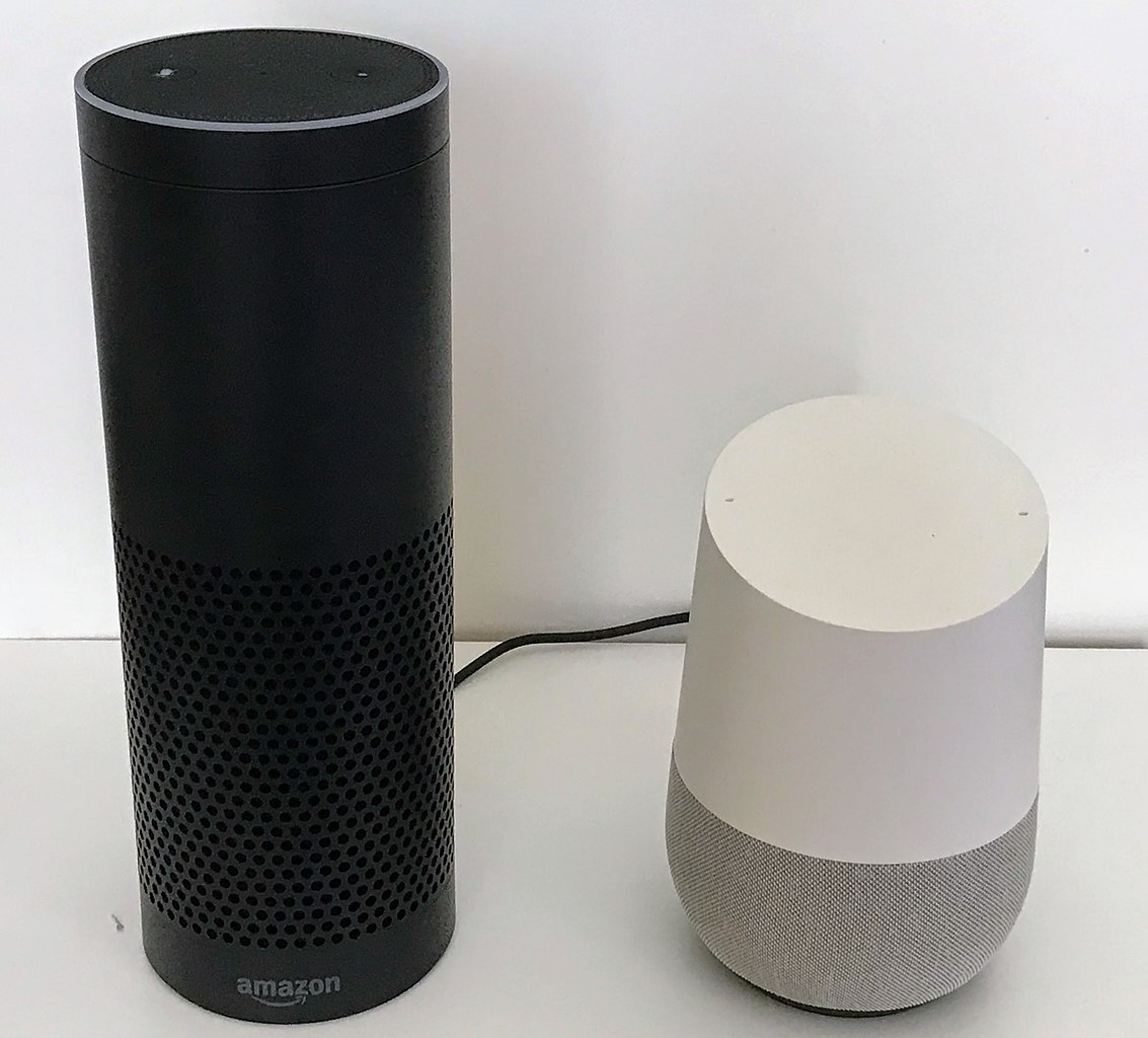 Amazon's Echo Plus (left) and Google's Google Home are examples of "smart speakers".