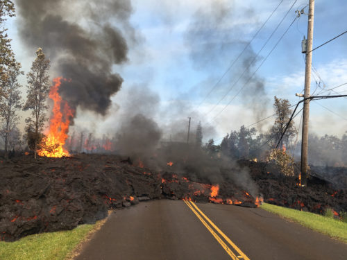 Lava flows over the road in Lailani Estates.