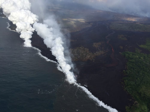 When the lava touches the sea water, it creates a white cloud called "laze".