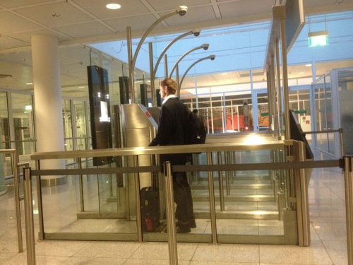 Man at facial scanner in Munich airport.