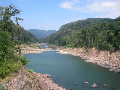 The water in this river in Laos was very low after a dam was built.