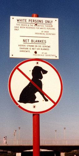 Sign from South Africa during apartheid saying a beach is for "White Persons Only".