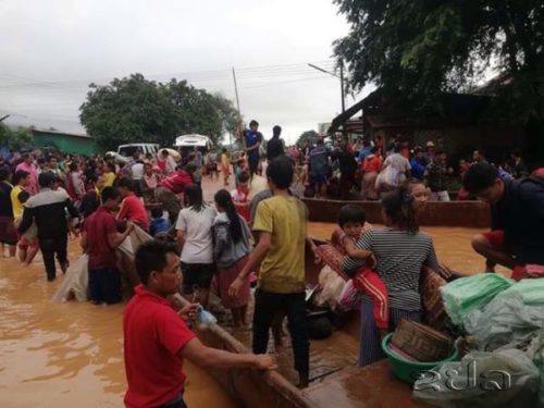 Lao News Agency photo of people fleeing flood.