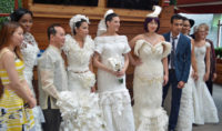 Some of the toilet paper dress creators with their models.