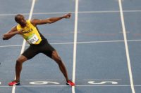 Usain Bolt doing his famous "lightning bolt" move.