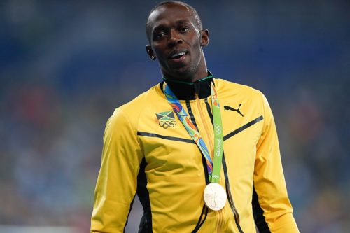 Bolt with gold medal in the 2016 Olympics.