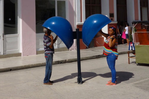 People using Cuban pay phones.