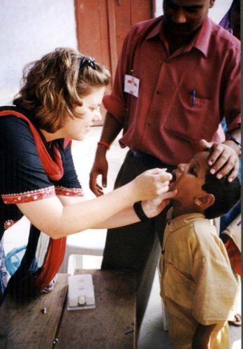 Child getting an oral polio vaccine in India.