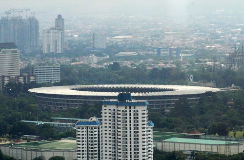 The round building is Gelora Bung Karno Stadium.