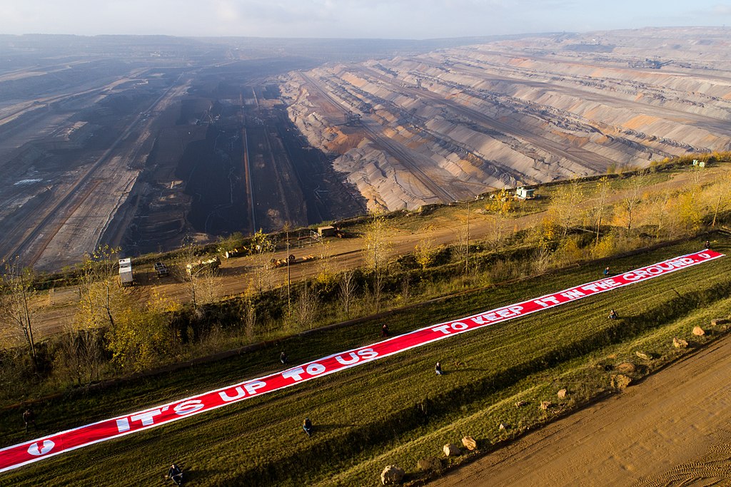 Jugendnetzwerk für politische Aktionen unfolded a huge banner in the Hambach lignite mining pit, 2017 – "It's up to us to keep it in the ground."