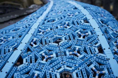 Close-up of Lego Bugatti, showing blue Lego Technic pieces.
