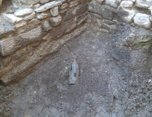 Stone jar found in corner of Cressoni Theater basement.