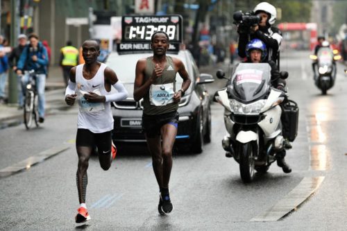 Eliud Kipchoge (left) and Guye Adola in the 2017 Berlin Marathon.