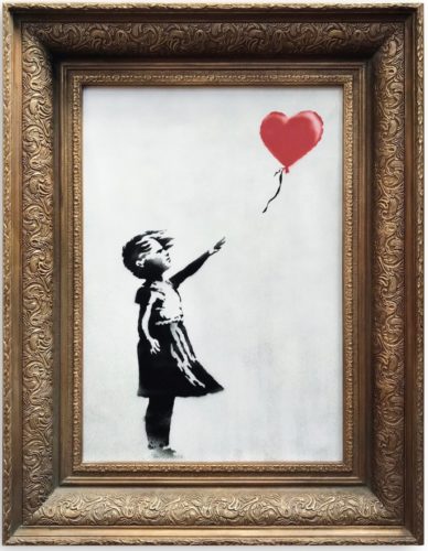 Banksy's picture "Girl With Balloon" in a special frame.