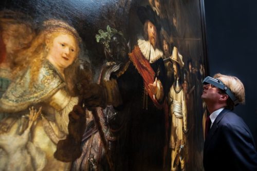 Museum Director Taco Dibbits takes a close look at the painting.