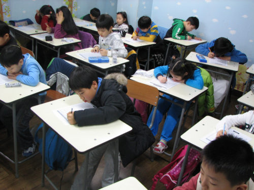 Students in a special academic training school in South Korea.