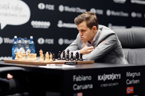 Magnus Carlsen beats Fabiano Caruana in world chess championship play-off  after 12 draws - ABC News