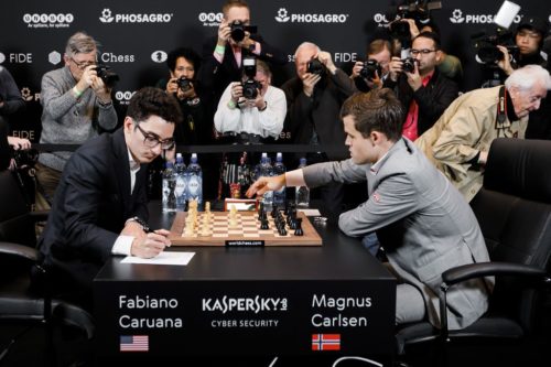 Fabiano Caruana (left) faces Magnus Carlsen in the World Chess Championships, 2018.