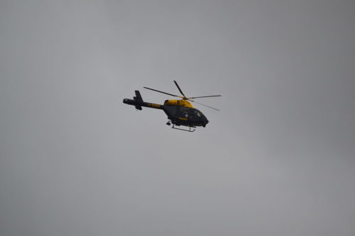 McD-D Helicopters MD-902 of Police-UK crossing through the approach at London Gatwick-LGW, 10/08/15.