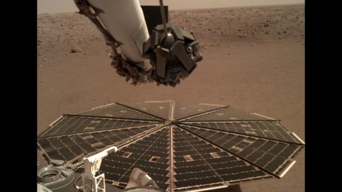 One of InSight's 7-foot (2.2 meter) wide solar panels was imaged by the lander's Instrument Deployment Camera, which is fixed to the elbow of its robotic arm.