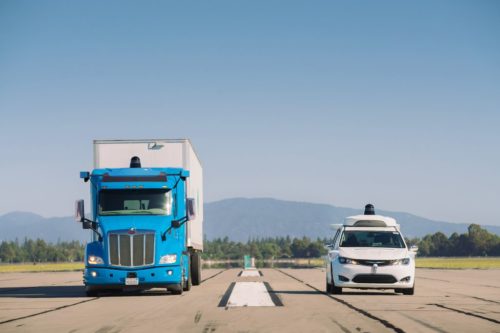 Waymo semi-truck and Waymo Car