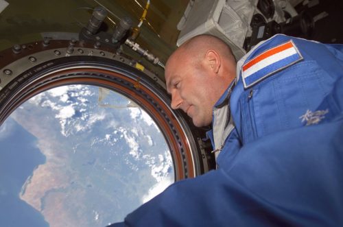 European Space Agency astronaut Andre Kuipers of the Netherlands looks through the Earth observation window in the Destiny laboratory on the International Space Station soon after arriving in a Soyuz spacecraft for several days' stay onboard the Earth-orbiting complex.