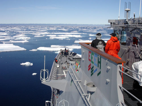 ARCTIC CIRCLE (June 12, 2007) - Ship's Serviceman Seaman Recruit Jamal Powell, left, and Seaman Recruit Stephen Harmon stand forward lookout watch aboard guided-missile cruiser USS Normandy (CG 60) as the ship navigates an ice field north of Iceland. U.S. Navy photo by L.t. j.g Ryan Birkelbach (RELEASED)