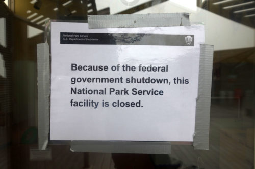 Sign saying "Because of the federal government shutdown, this National Park Service facility is closed."