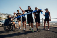 Ultra runner and water campaigner, Mina Guli celebrates her support team finishing a marathon in Cape Town, South Africa during the #RunningDry Expedition, on 5 January 2019