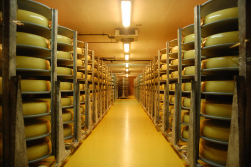 Emmentaler Schaukäserei - cheese stored in a large cheese warehouse in Switzerland.