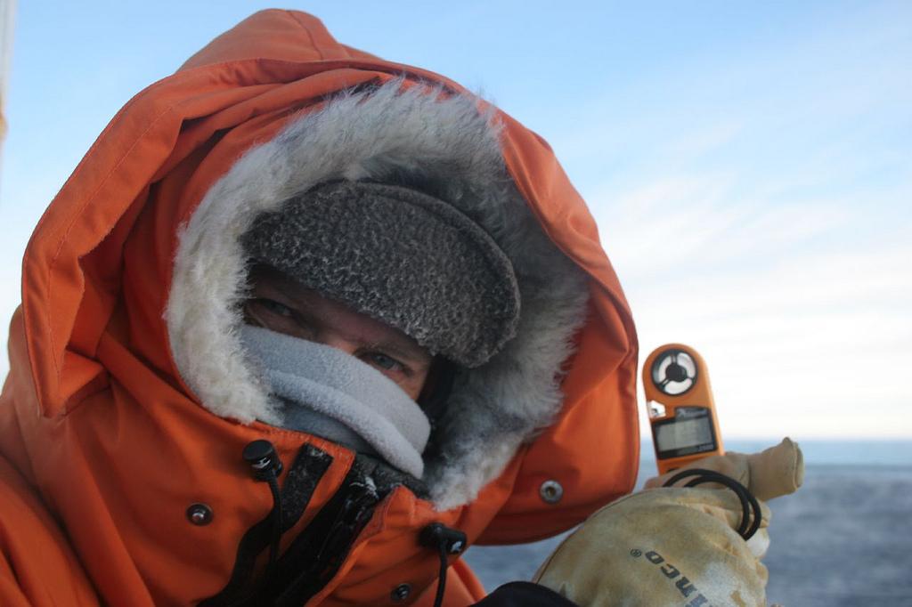 Man in warm gear on the Ross Ice Shelf in Antarctica. The wind chill is minus 28 C