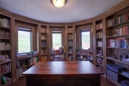 Wooden desk in round library.