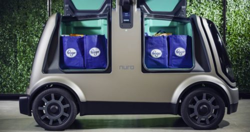 Nuro's R1, doors open showing groceries.