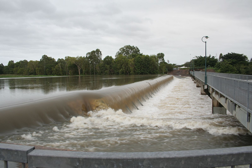Flooded Weir in Townsville, 2009. After 28 days of rain - 4.5 feet of water over the dam. that bridge is 15 feet high!