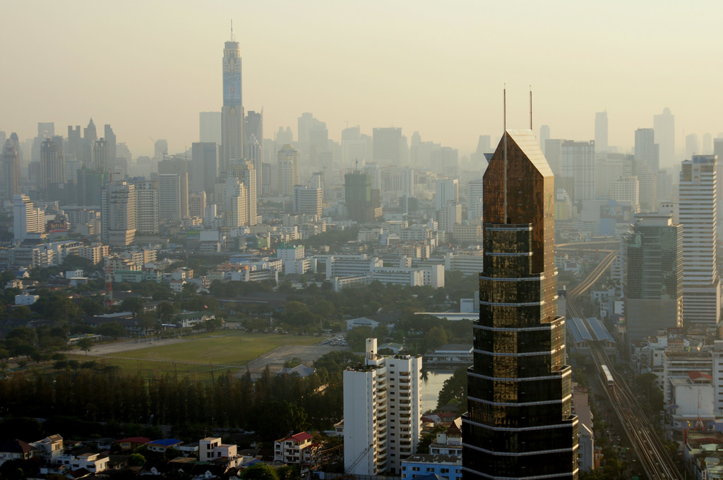 View of Bangkok from above, with dust and smog. Roof of Phaholyothin Place tower, Samsen Nai, Bangkok, Thailand