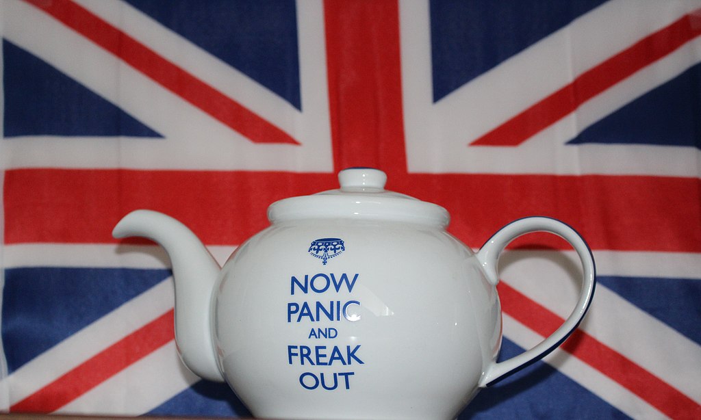 Brexit Graphic - Teapot in front of British Flag with the words "Now Panic And Freak Out".