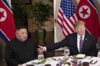 President Donald J. Trump and Chairman Kim Jong Un at dinner in Hanoi