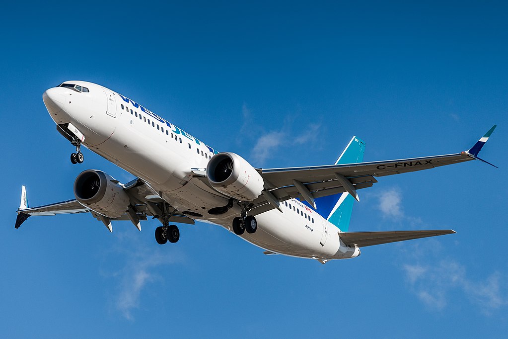 WestJet Boeing 737 MAX 8 landing in Calgary, Alberta, Canada.