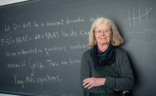 Karen Uhlenbeck in front of a chalkboard