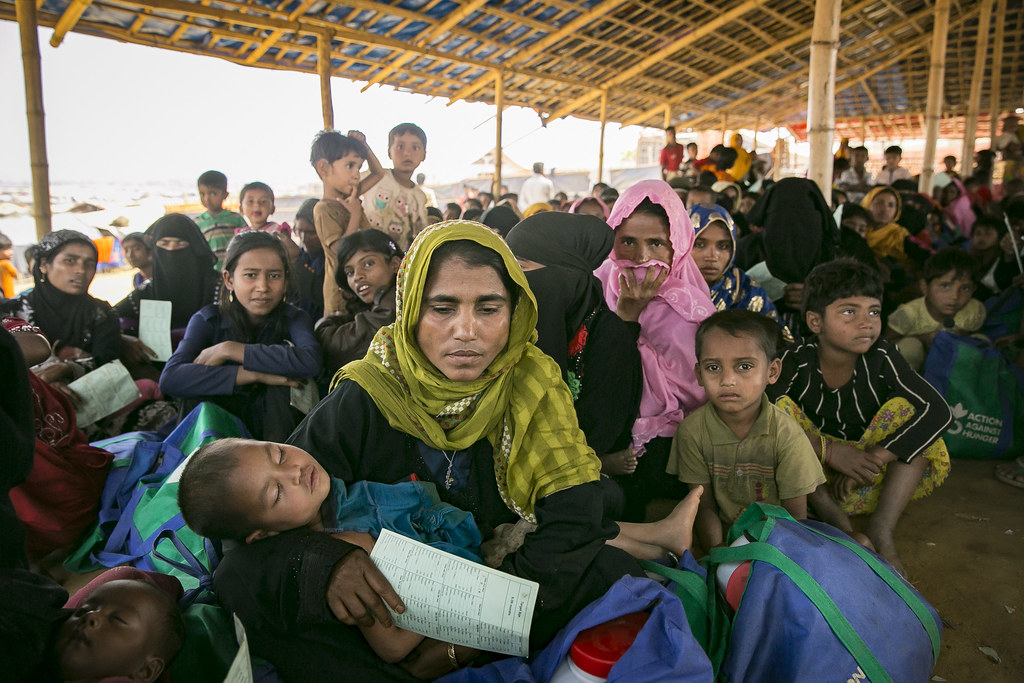 Women are seen at an ACF donation point In Balukhali Rohingya Refugee camp February 1, 2018 in Chittagong district, Bangladesh. UN Women/Allison Joyce