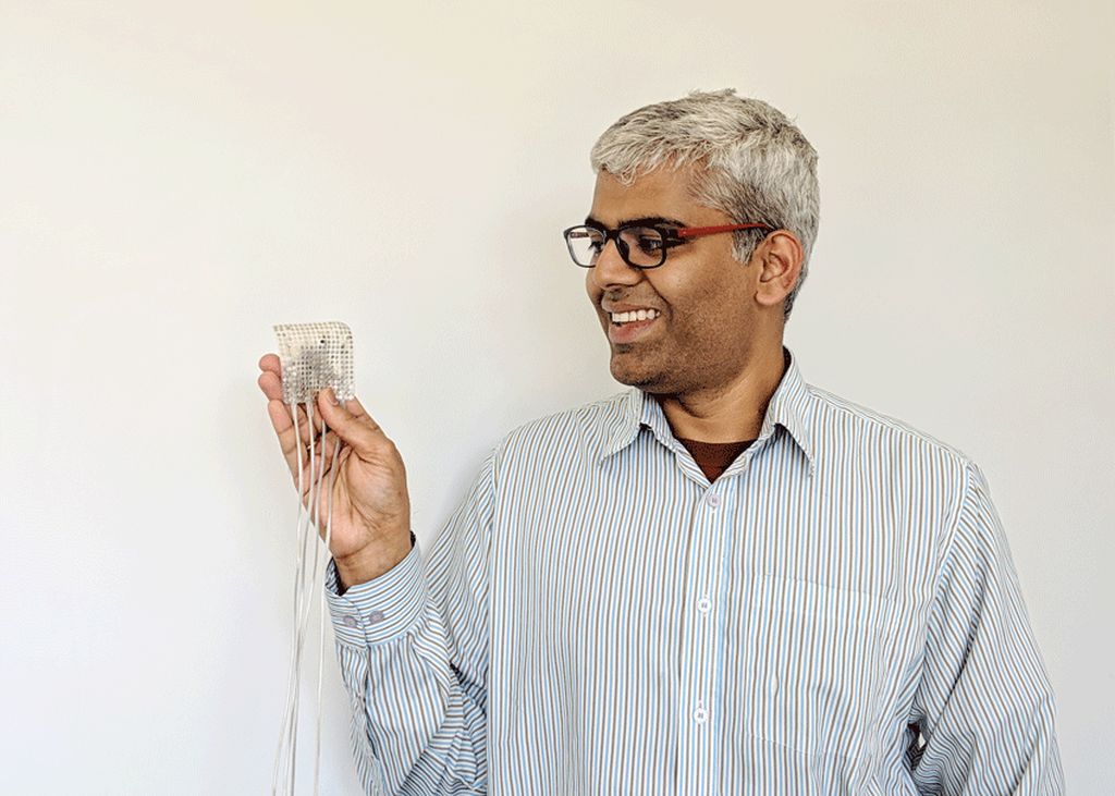 Gopala Anumanchipalli, Ph.D., holding an example array of intracranial electrodes of the type used to record brain activity in the current study. Credit: UCSF