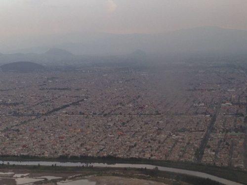 Flying over Mexico City, Mountains, smog