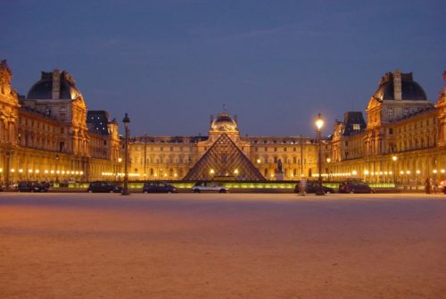 The court of the Louvre with its pyramid at night.