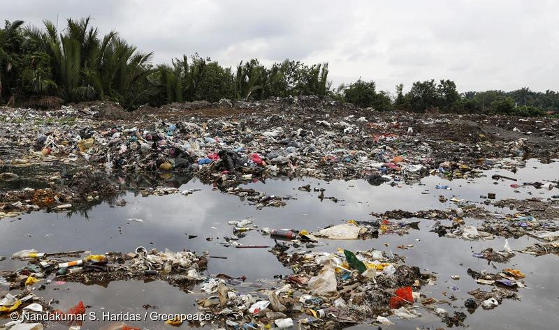 Waterway clogged with plastic in Malaysia.