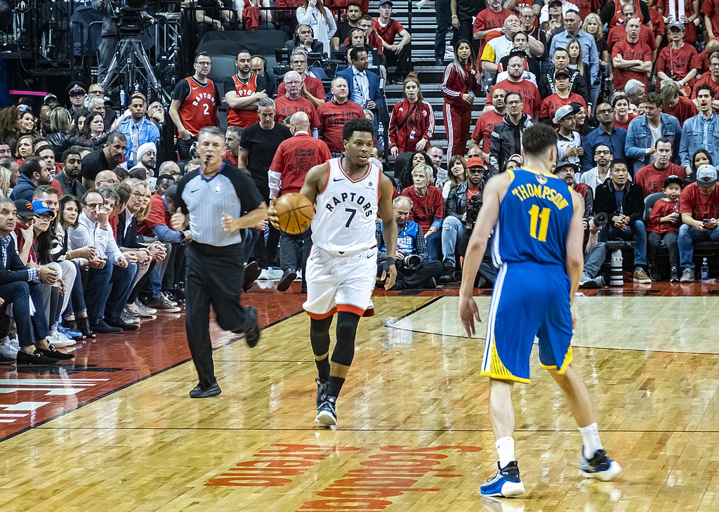 Kyle Lowry, with the ball, dribbles toward Klay Thompson during the 2019 nba finals