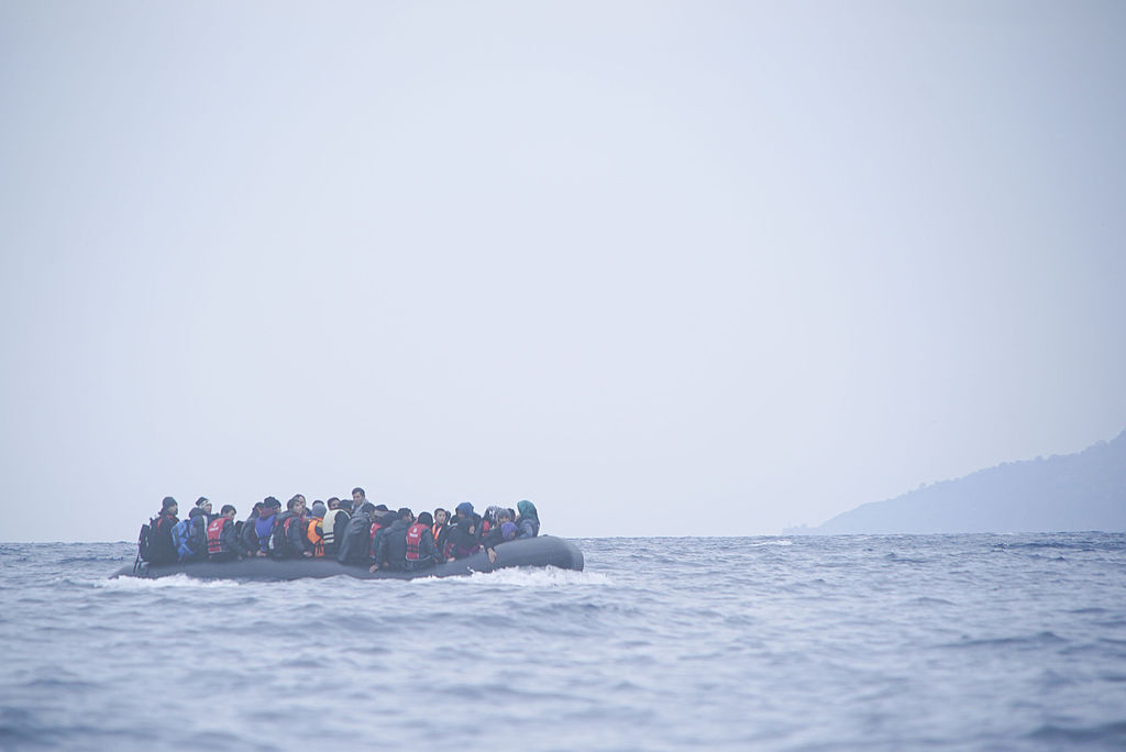 Refugees on a boat crossing the Mediterranean sea, heading from Turkish coast to the northeastern Greek island of Lesbos, 29 January 2016.