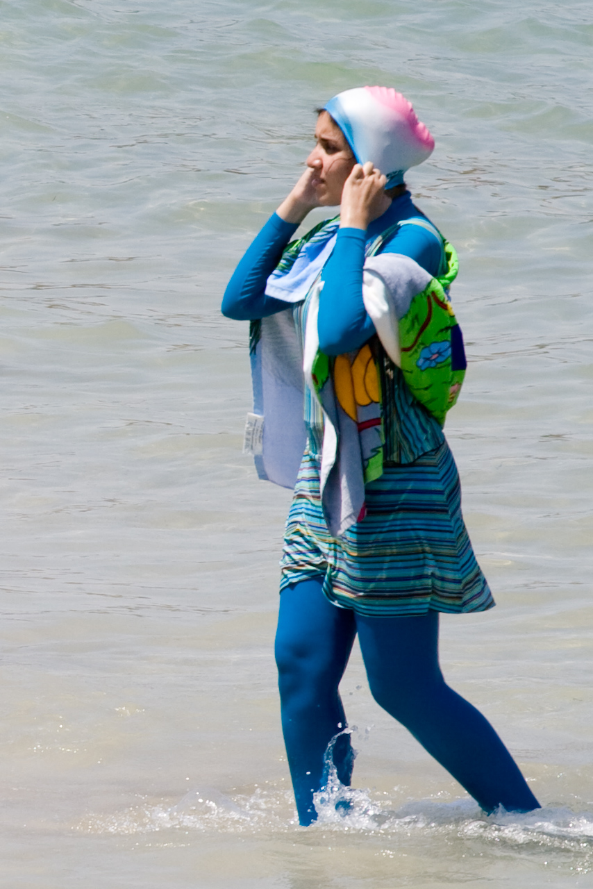 girl in fashionable burkini sighted on the beach of Alexandria